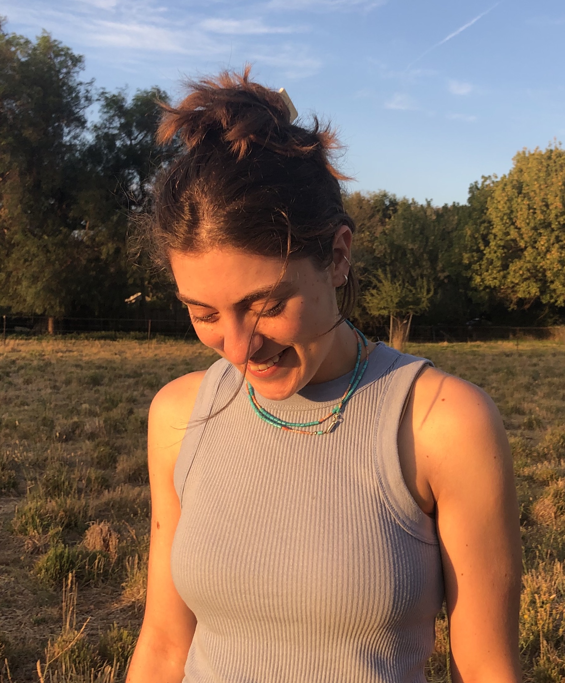 Photo of Tess, in the Australian countryside.